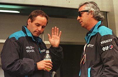 Gerhard Berger of Benetton speaks with Flavio Briattore (Argentinean Grand Prix 1996)